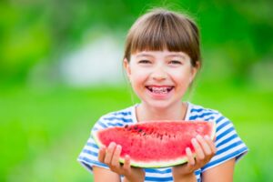Learn more about the benefits of starting your child in braces over their summer break.
