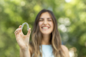 Learn from the best orthodontist in Ft Collins if you should do Invisalign or implants first.