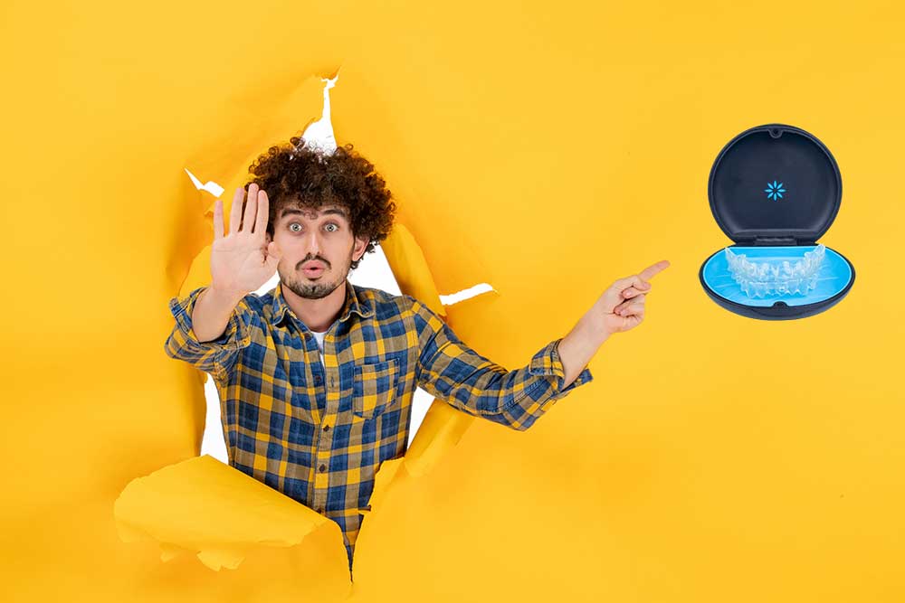 Invisalign-Mistakes-Man-Pointing