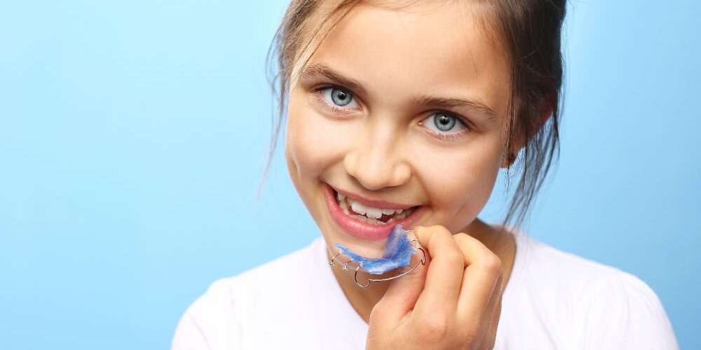 Child with a retainer in fort collins co